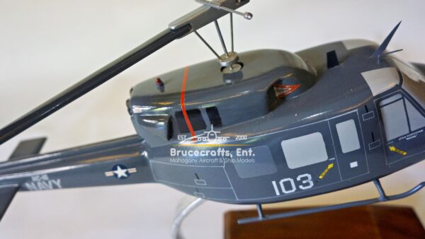 Model of UH-1N Twin Huey US NAVY 103 Aircraft with detailed craftsmanship.